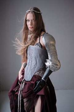 Girl in armor with artificial arm