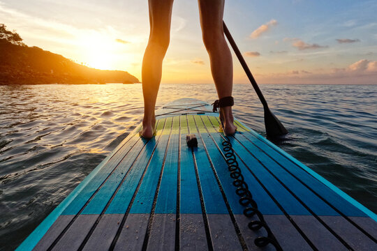person on SUP in sea, summer holidays on the beach