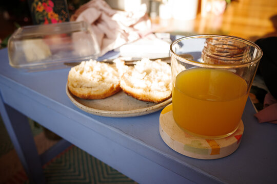 Breakfast on a Table With Two Pieces of Bread and Drink