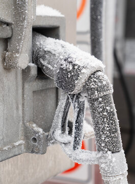 Frozen Pipes on Equipment in Cold Weather Conditions at a gas pump.