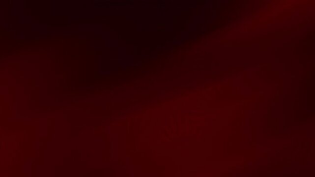 Rich dark red and black gradient background featuring a soft vignette, creating a dramatic, luxurious, and sophisticated abstract backdrop perfect for modern digital design