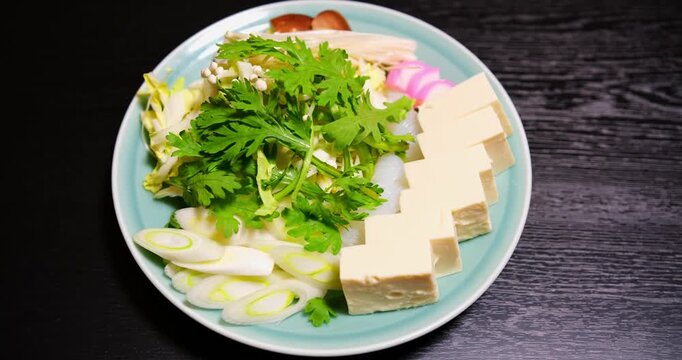 Japanese Shabu Shabu Ingredients Plate with Tofu, Vegetables and Mushrooms, Food Close Up