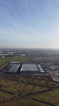 Aerial drone footage of a new data center under construction in Groningen Westpoort, highlighting big data processing, high performance computing, server infrastructure, and cloud technology.