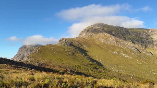 Hans Koo mountain peak in the late afternoon summer light.