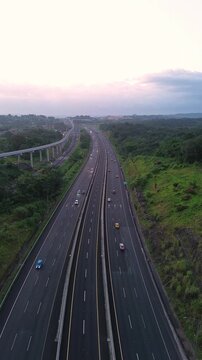 A highway with cars driving on it