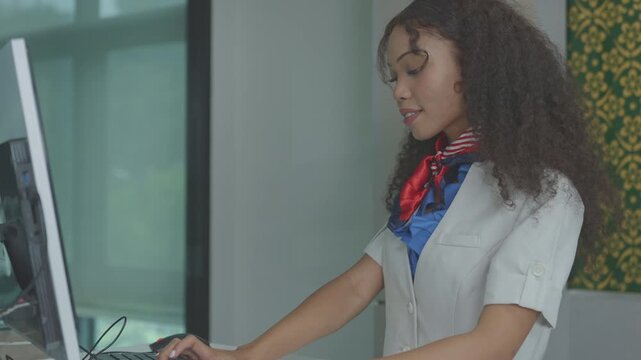 Receptionists at the ticket check or check-in counter. They are cheerful and provide service to tourists and business travelers, both domestic and international. Airline business