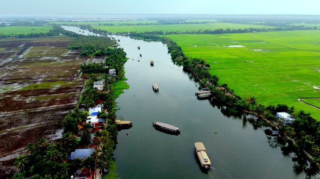 Kerala House boats floating in kuttanadu canal alappuzha , areal view of Alappy canal kuttanadu