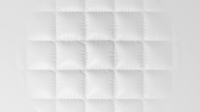White quilted fabric surface expanding with soft shadow texture in smooth motion