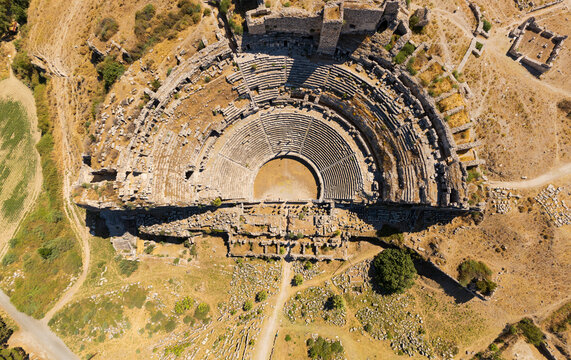 Balat, Didim, Turkey. Detailed top down aerial view of Miletus Theatre amphitheater focusing on stage area and architectural details. Aerial view