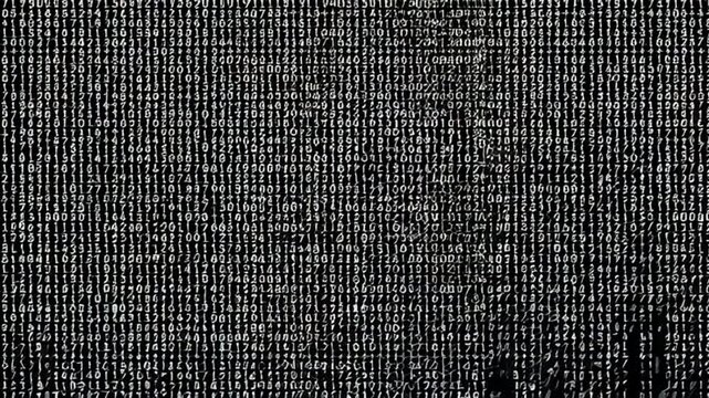 Digital Code: A sea of binary code, the intricate language of the digital world, is displayed, symbolizing the essence of technology and information.