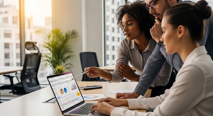 Diverse Team Collaborating on Laptop Project.