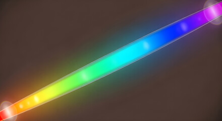Naklejka premium A vibrant rainbow colored led light strip with bright glowing lights on a dark background
