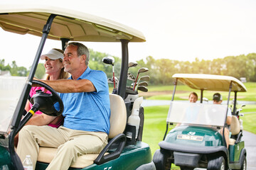Couple of friends, driving and golf cart at country club on break, happy and double date on vacation. People, partner and buggy for transport, recreation or getaway with vehicle at course in summer © BuyoutReese08/peopleimages.com