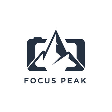 Minimalist camera and mountain peak silhouette logo for photography adventure or outdoor travel branding featuring the text FOCUS PEAK