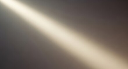 Dramatic sunbeam piercing dark clouds with golden light rays for spiritual or hopeful background