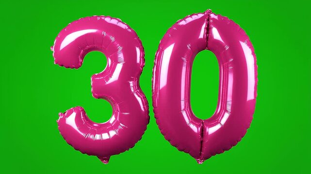 Metallic pink number 30 balloon moving forward on green background