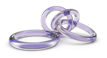 Naklejka premium Interlocking smooth transparent rings exhibit subtle violet coloration against a bright background.