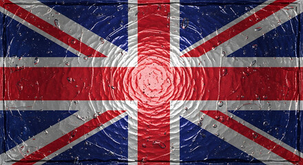 Fototapeta premium A dramatic close-up representation of the United Kingdom flag texture featuring prominent water droplets suggesting rain or condensation over the patriotic colors of blue, white, and red symbolism.