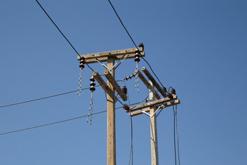 Install high-voltage power lines on utility poles.
