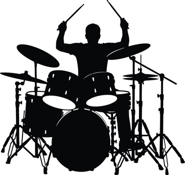 Silhouette of a drummer playing a drum kit
