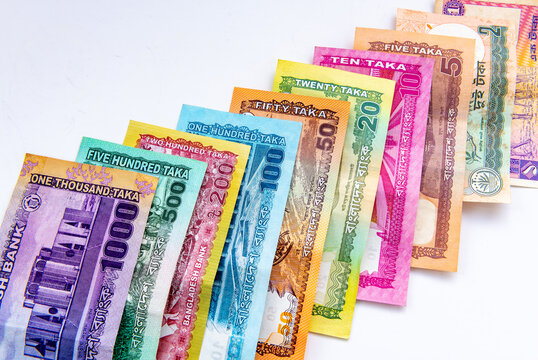 The entire range of Bangladesh bank notes from 1 to 1000 Taka isolated on white.