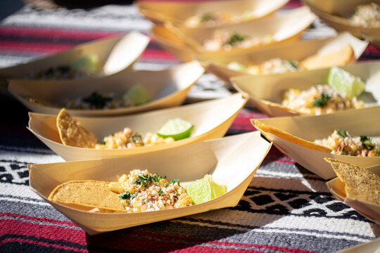 Loose view of samples of Mexican elote dishes