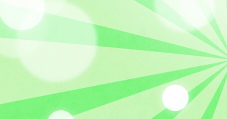 Radiating green radial sunburst fanning left on canvas showing white bokeh and faint grain vignette