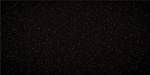 A dark abstract texture of rain drops on a window creates a starry night sky pattern resembling white dust and snow falling across the black universe of a deep space galaxy © FANUSH