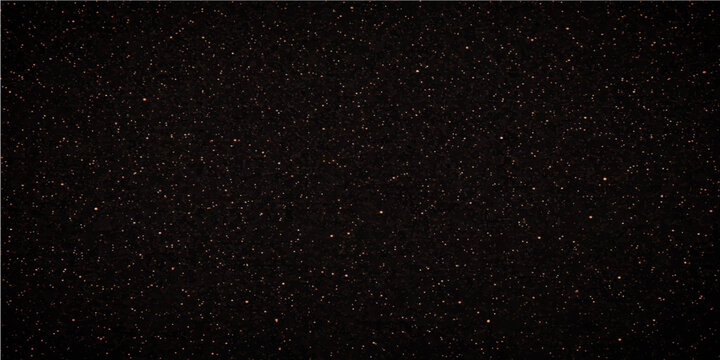 A dark abstract texture of rain drops on a window creates a starry night sky pattern resembling white dust and snow falling across the black universe of a deep space galaxy
