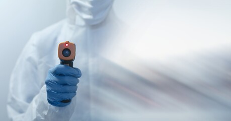 Composition of female scientist in lab using thermometer with motion blur
