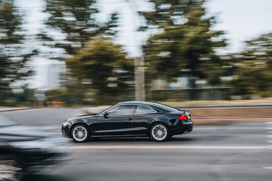 Ukraine, Kyiv - 29 Jule 2021: Black Audi S5 car moving on the street. Editorial