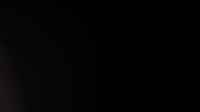 Bold light leak and flare transitions with cinematic bokeh and lens move