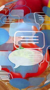 Vertical video: Speech bubbles drifting over red tomato from frame1, showing calyx and chat