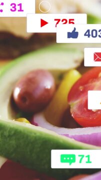 Vertical video: Purple user badge appearing, icons drifting over tomato and avocado, showing likes