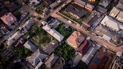 lush green vegetation scattered in-between urban civilization. © Ariyo