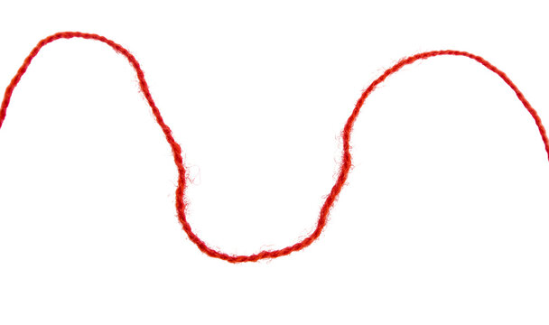 Red thread isolate on white background. Selective focus. Old.