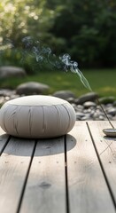 Incense smoke on wooden deck outdoors.