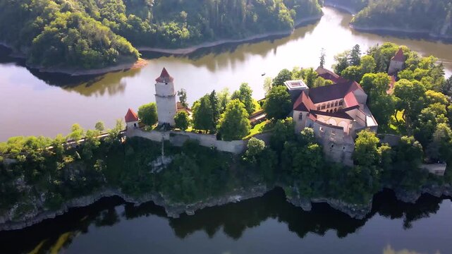 Drone aerial view of Zvikov Castle at sunset above Orlik Reservoir