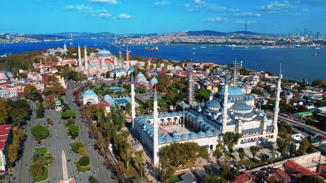 Stunning Istanbul: Blue Mosque and Hagia Sophia over Bosphorus and golden horn aerial view