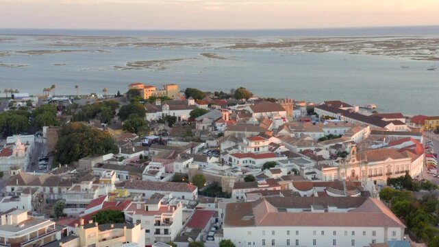 Faro Portugal aerial drone shot flying forward over historic city