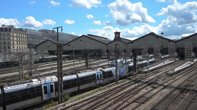 A train entering in the Gare du Nord train station in Paris, France