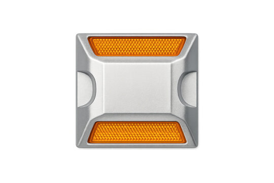 Silver road stud with orange reflective markers for traffic safety and guidance
