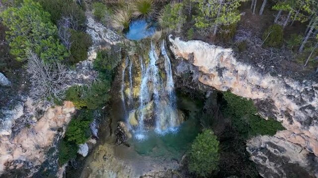 Ivy Waterfall in Mora de Rubielos, Teruel, Aragon, seen from a drone in slow motion