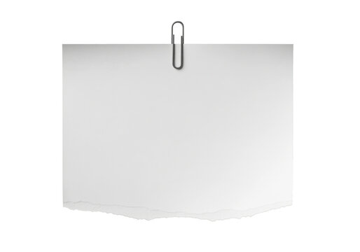 Metal paperclip holds white torn paper scrap, providing a blank memo space for office business announcement or daily reminder message against a clean neutral background for documentation