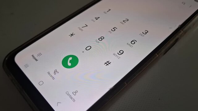 Close up of dialing pad screen of mobile phone.