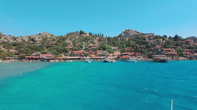 Kalekoy, Demre, Turkey - June 14, 2025: Simena Castle is an ancient Lycian fortress in Kalekoy village of the Demre district in the Antalya Province of Turkey.