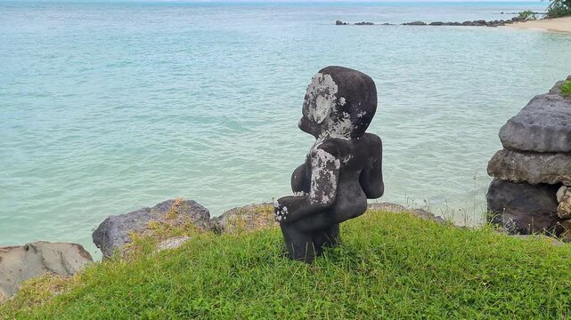French Polynesia. Ancient Anini Mara'e Ceremonial Site and Stone Sculptures by Coast
