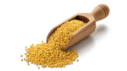 Yellow mustard seeds in wooden scoop on white background