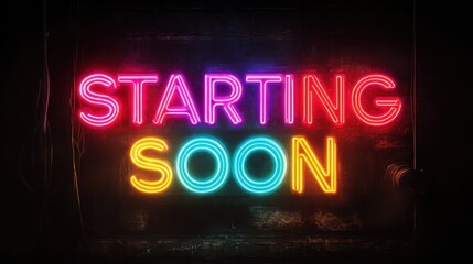 Bright neon sign displays the phrase starting soon in multiple colors at a casual event location