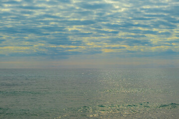 Nerja Beach Waves Under Cloudy Sky